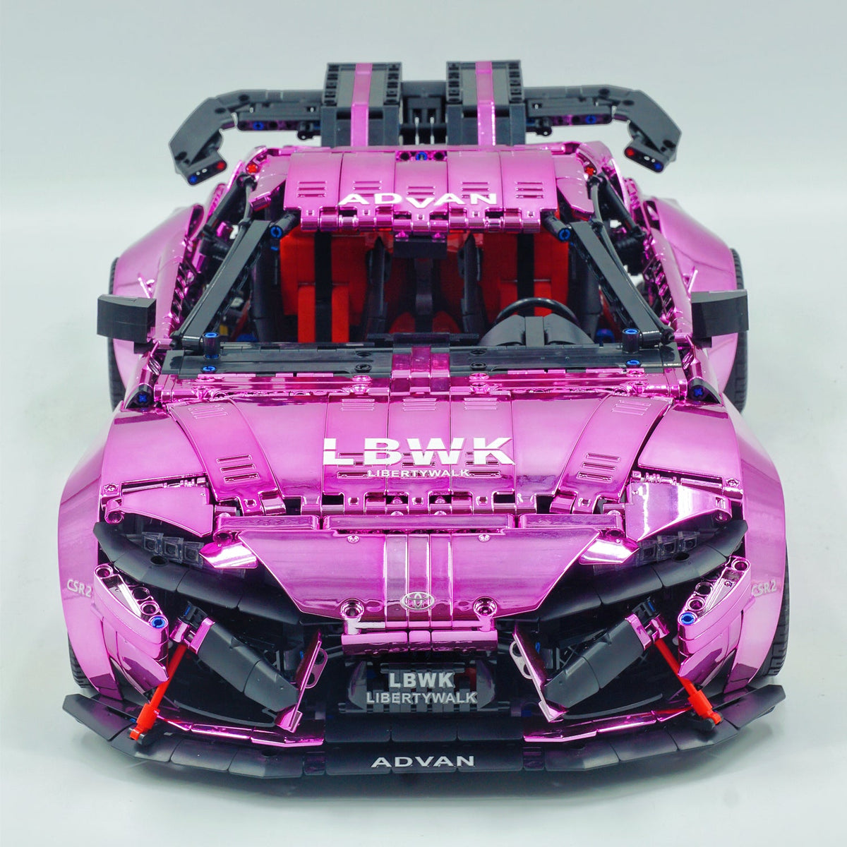 Trilumity Motorized Building Block Set: 1:8 Toyota Supra Electroplating Pink Limited Edition, Electric Air Suspension, Rear Accelerator Blade linkage