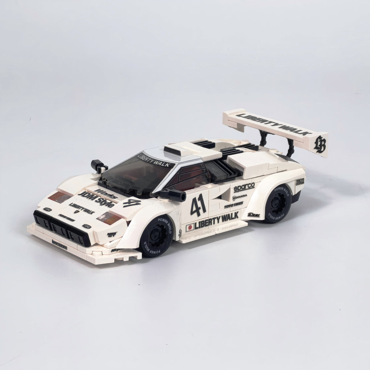 Trilumity Motorized Building Block Set: 80s Wedge Supercar Widebody Edition | Container Display Case (338-Piece)