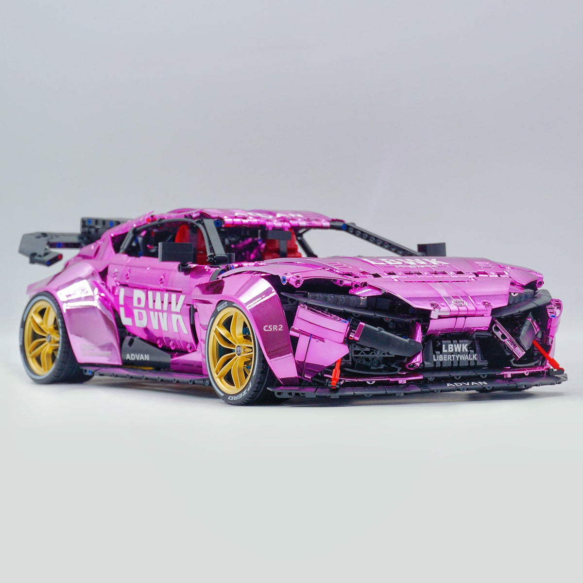 Trilumity Motorized Building Block Set: 1:8 Toyota Supra Electroplating Pink Limited Edition, Electric Air Suspension, Rear Accelerator Blade linkage