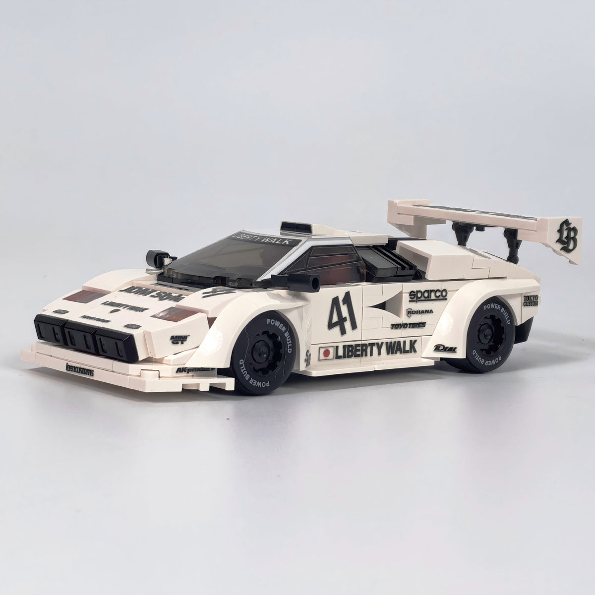 Trilumity Motorized Building Block Set: 80s Wedge Supercar Widebody Edition | Container Display Case (338-Piece)