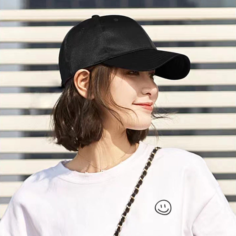 Trilumity Curly Baseball Cap Wig in Natural Black, front view