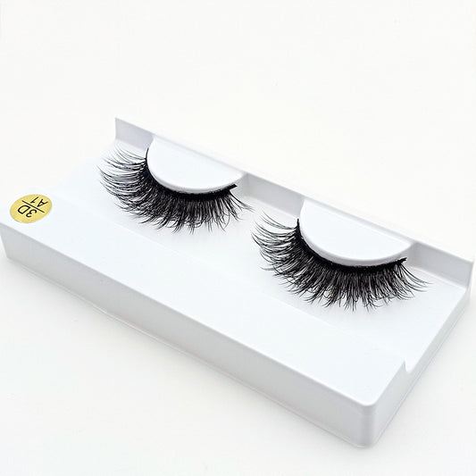 Trilumity Wispy false lashes in Black, lashes shown in the tray